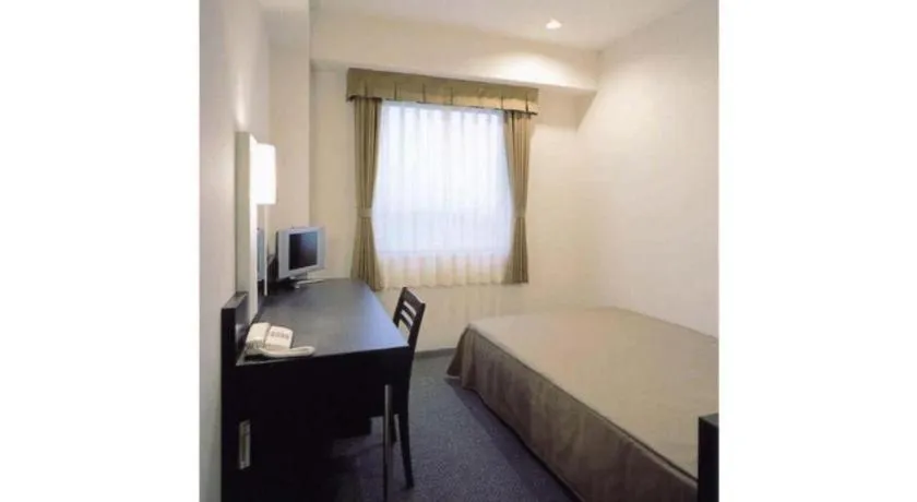 Bed in Hirata Maple Hotel