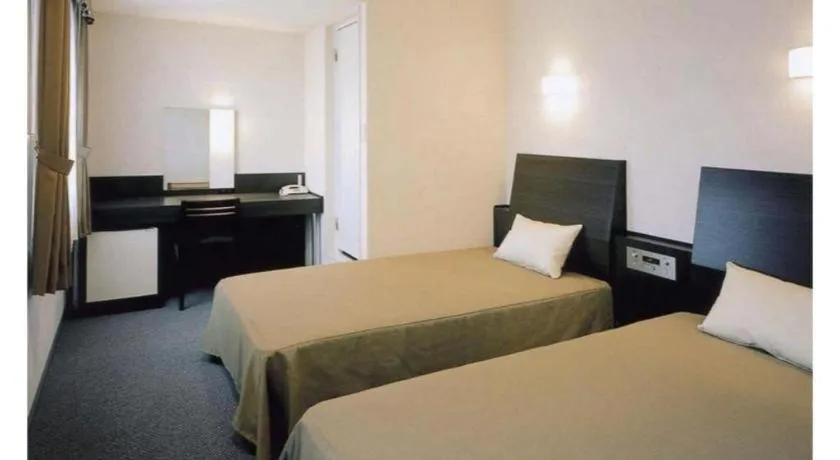 Bed in Hirata Maple Hotel