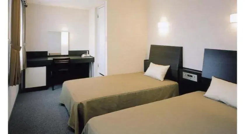 Bed in Hirata Maple Hotel Bed in Hirata Maple Hotel