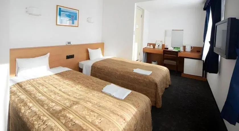 Bed in Hirata Maple Hotel Bed in Hirata Maple Hotel