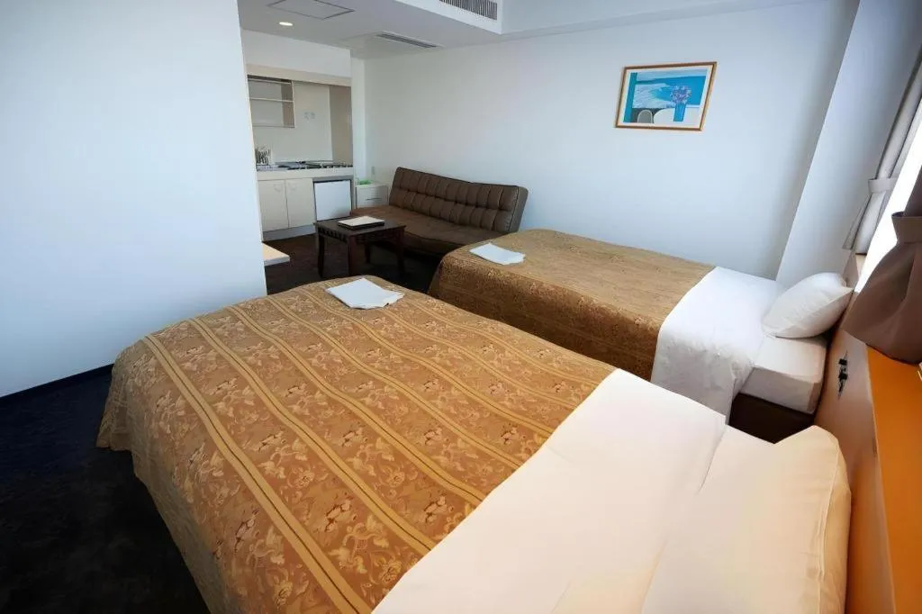 Bed in Hirata Maple Hotel