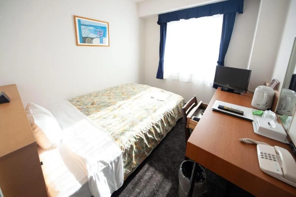 Bed in Hirata Maple Hotel