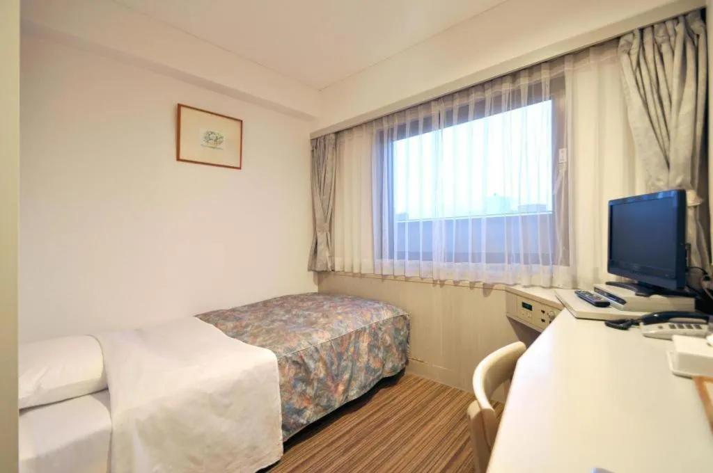 Bed in City Park Hotel Hachinohe