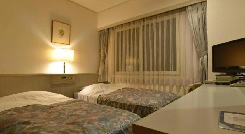 Bed in City Park Hotel Hachinohe