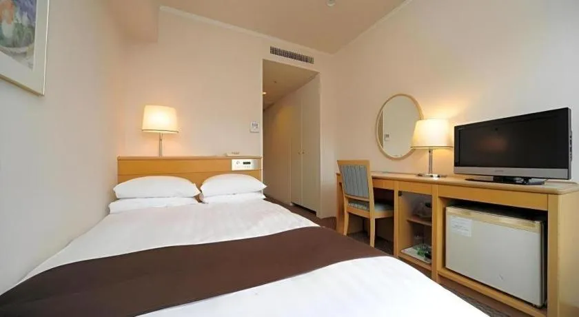 Bed in Green Hill Hotel Onomichi