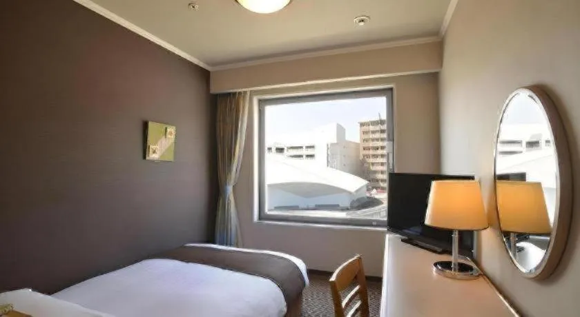 Bed in Green Hill Hotel Onomichi