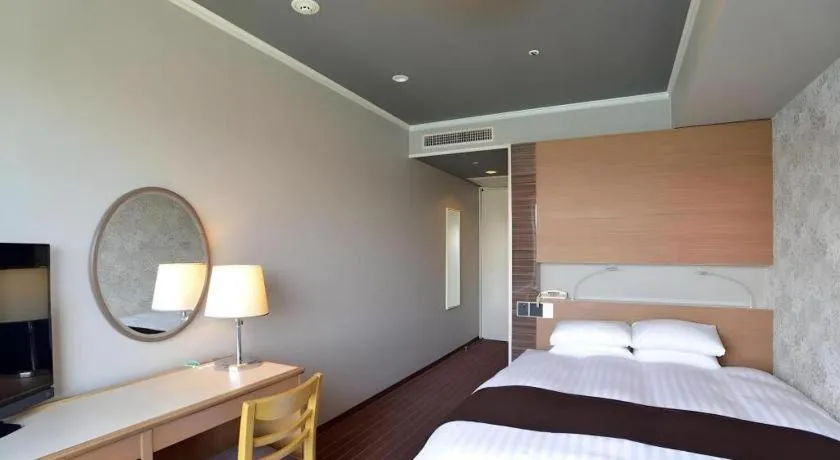 Bed in Green Hill Hotel Onomichi