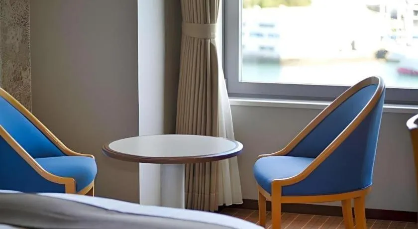 Bed in Green Hill Hotel Onomichi