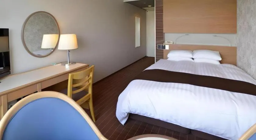 Bed in Green Hill Hotel Onomichi