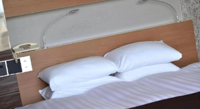 Bed in Green Hill Hotel Onomichi