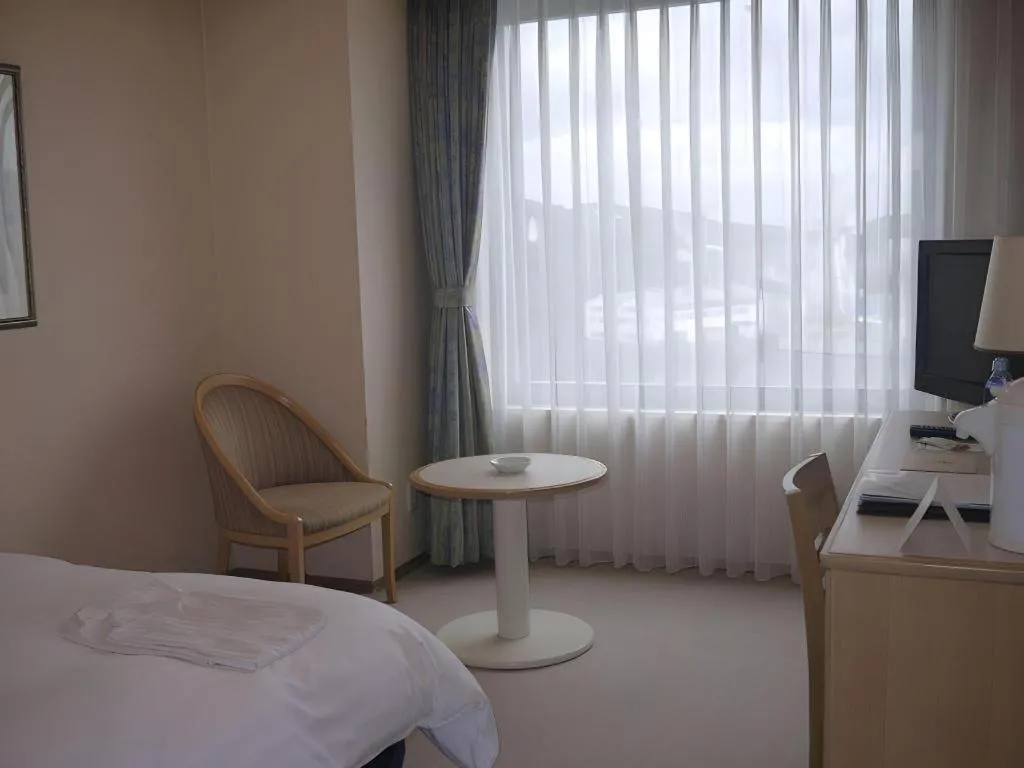 Bed in Green Hill Hotel Onomichi