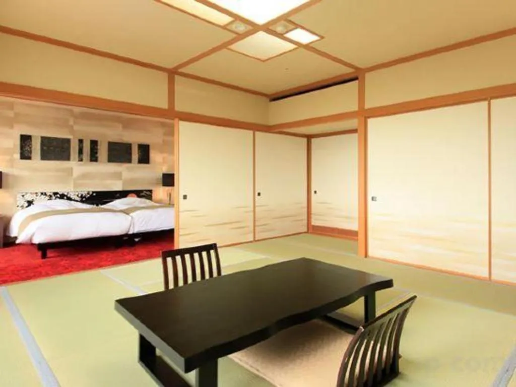 Bed in Centurion Hotel Technoport Fukui- Artificial Radium Hot Spring