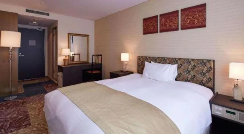 Bed in Centurion Hotel Technoport Fukui- Artificial Radium Hot Spring