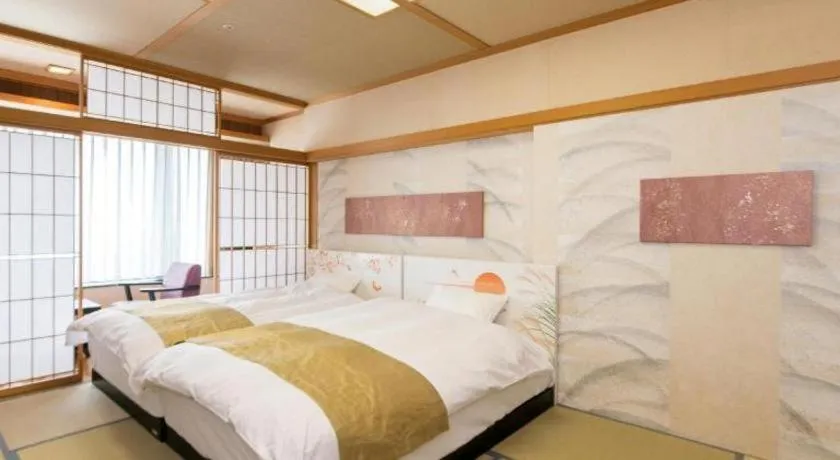 Bed in Centurion Hotel Technoport Fukui- Artificial Radium Hot Spring