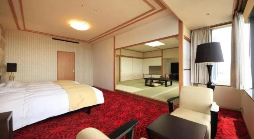 Bed in Centurion Hotel Technoport Fukui- Artificial Radium Hot Spring