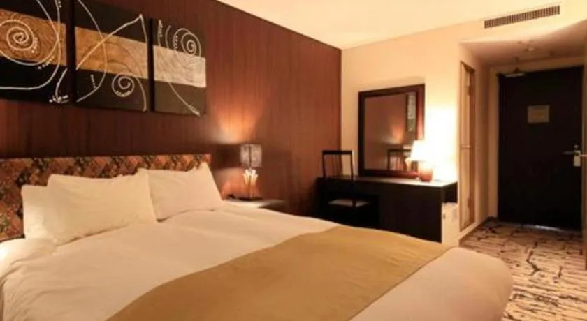 Bed in Centurion Hotel Technoport Fukui- Artificial Radium Hot Spring