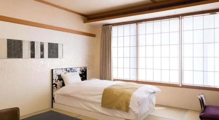 Bed in Centurion Hotel Technoport Fukui- Artificial Radium Hot Spring