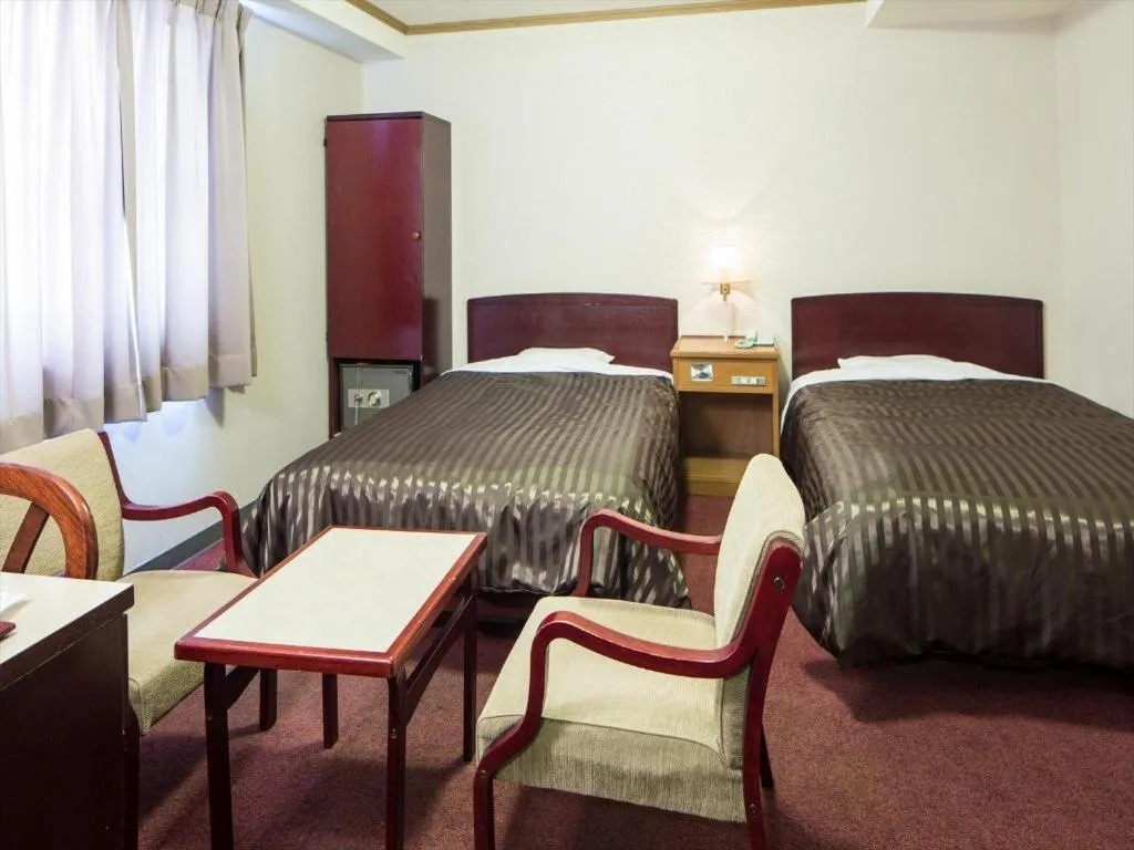 Bed in Ichimanri Hotel Golden Century