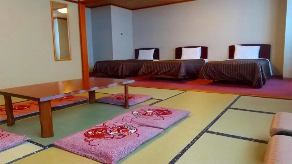 Bed in Ichimanri Hotel Golden Century