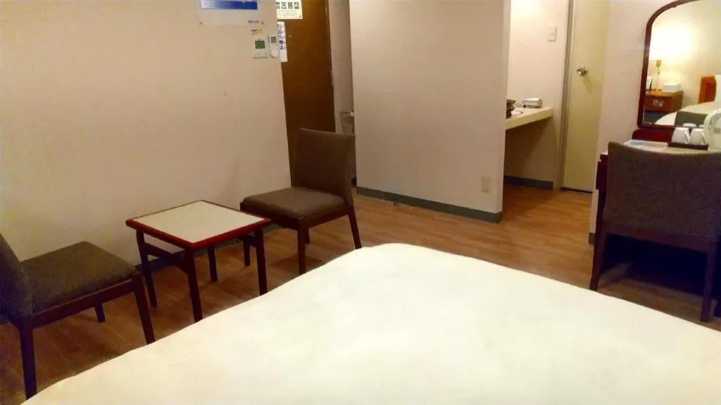 Bed in Ichimanri Hotel Golden Century