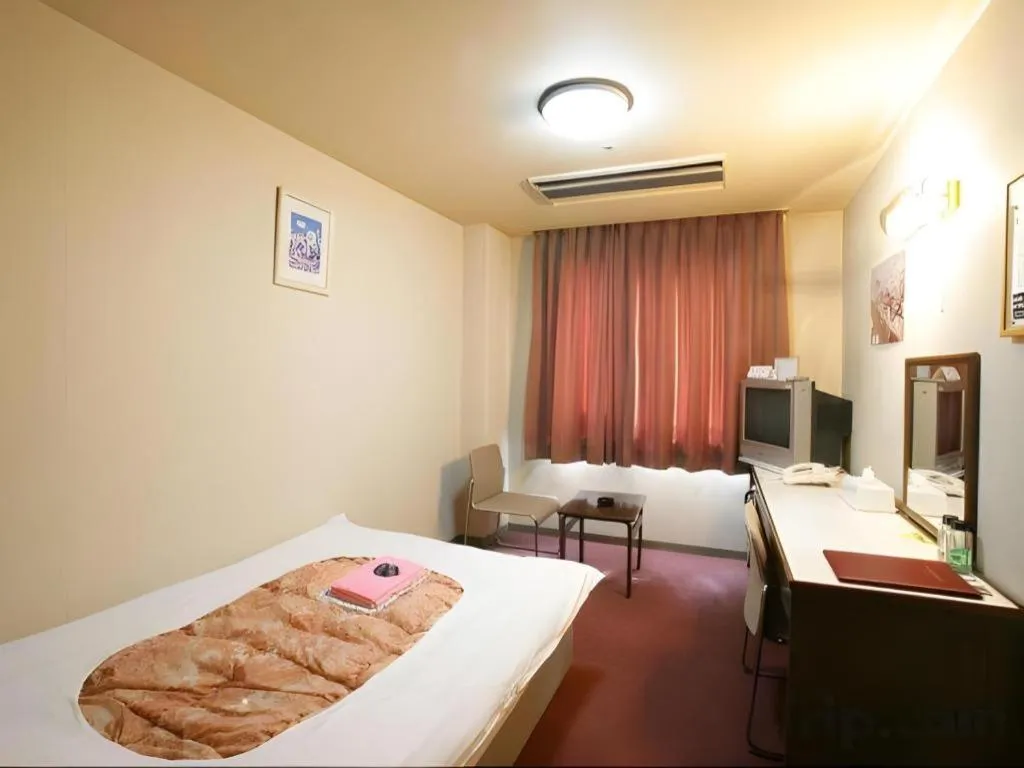 Bed in Ichimanri Hotel Golden Century