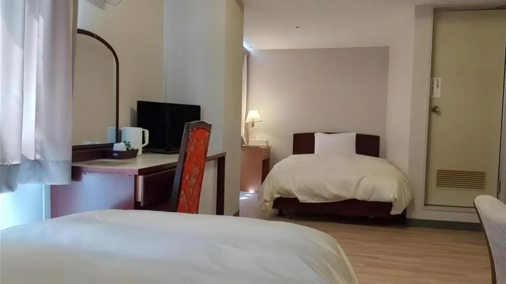 Bed in Ichimanri Hotel Golden Century