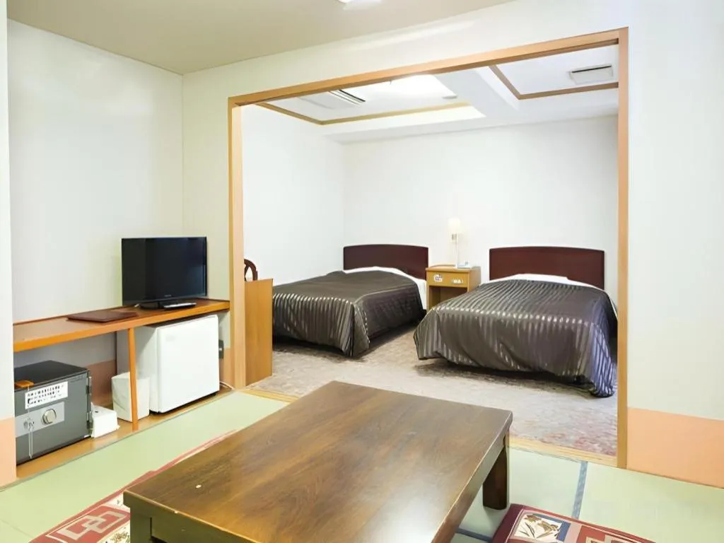 Bed in Ichimanri Hotel Golden Century