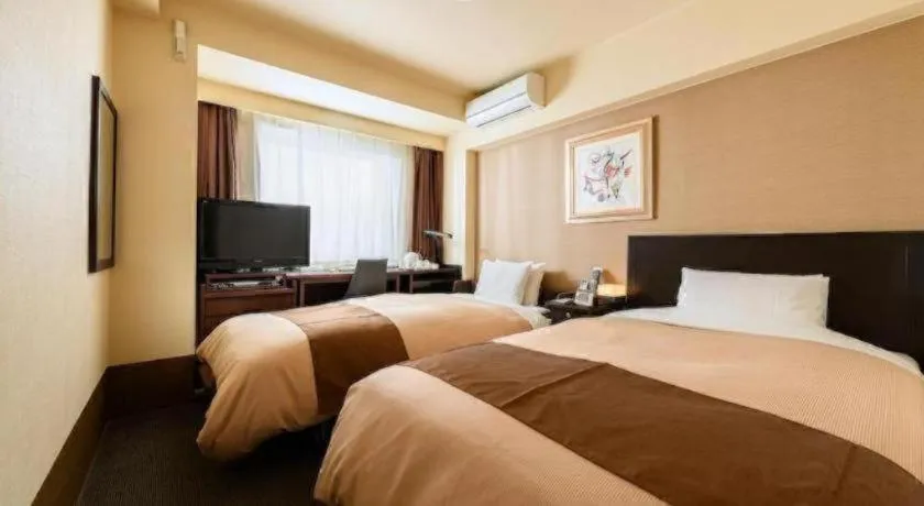 Bed in Hotel Sealuck Pal Kofu