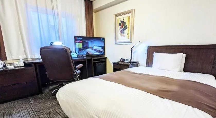 Bed in Hotel Sealuck Pal Takasaki