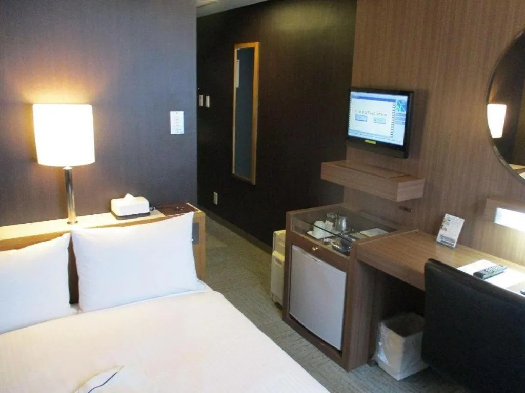 Bed in Niigata Keihin Hotel