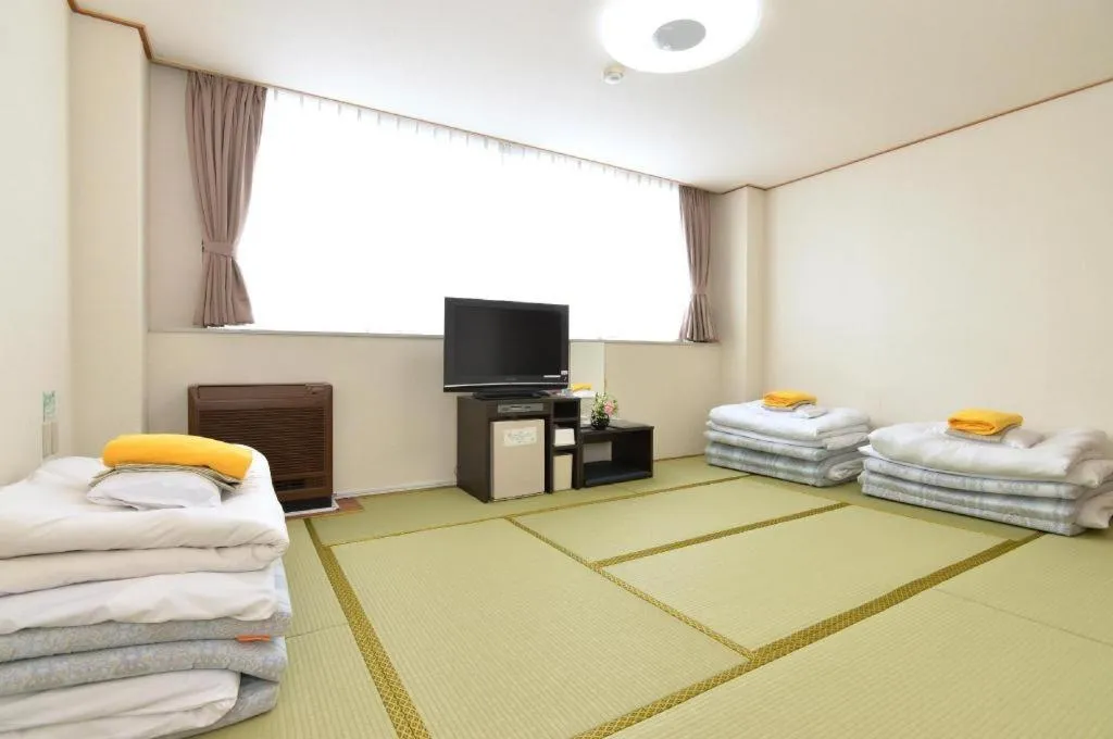 Bed in Business Hotel BL Kuwana