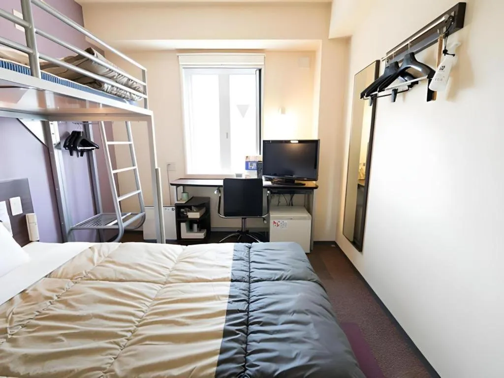 Bed in Super Hotel Satsuma Sendai