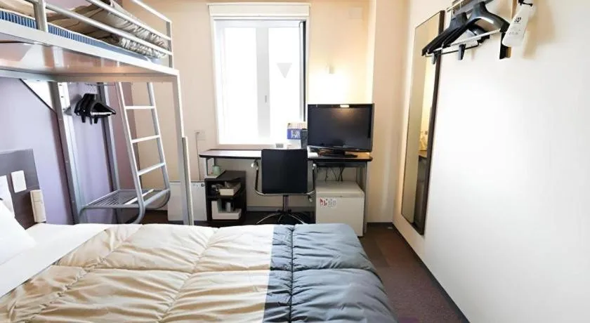 Bed in Super Hotel Satsuma Sendai