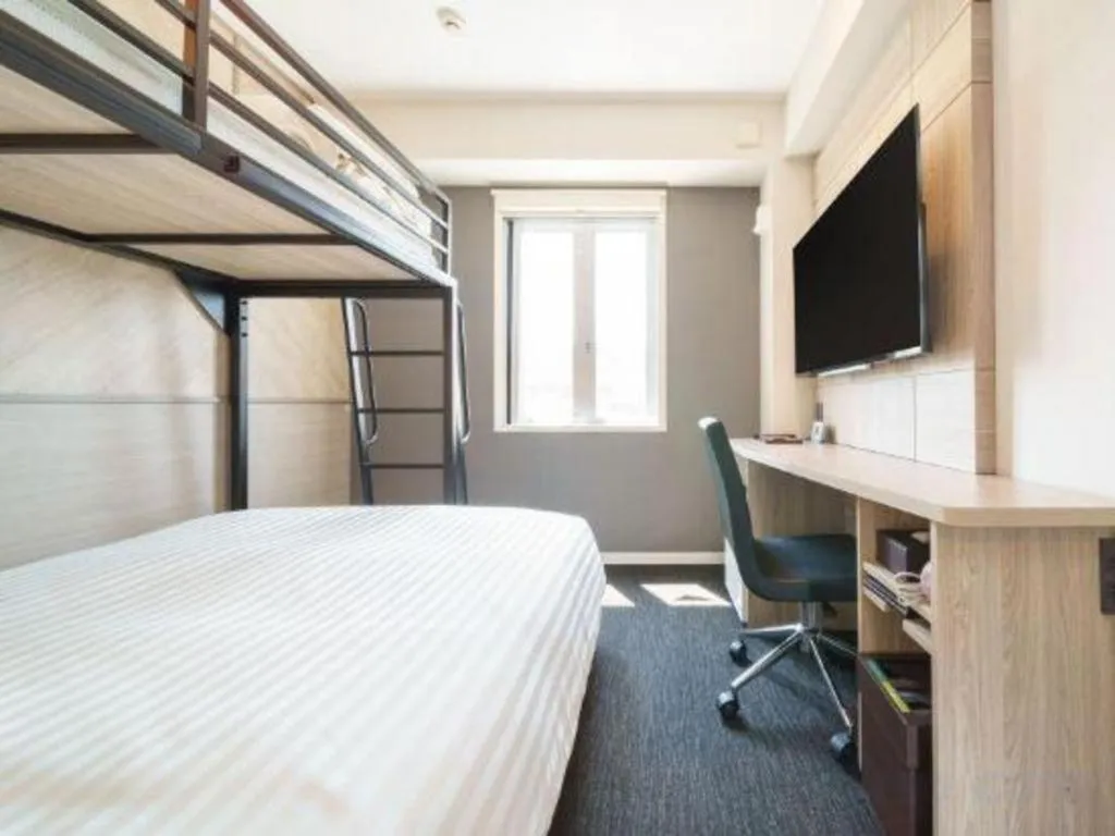 Bed in Super Hotel Satsuma Sendai