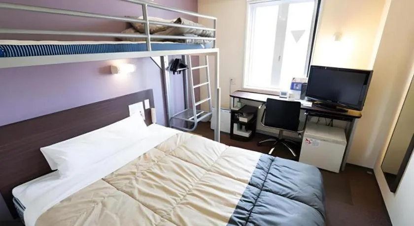 Bed in Super Hotel Satsuma Sendai