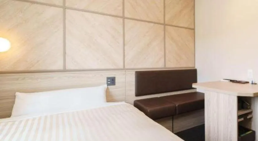 Bed in Super Hotel Satsuma Sendai