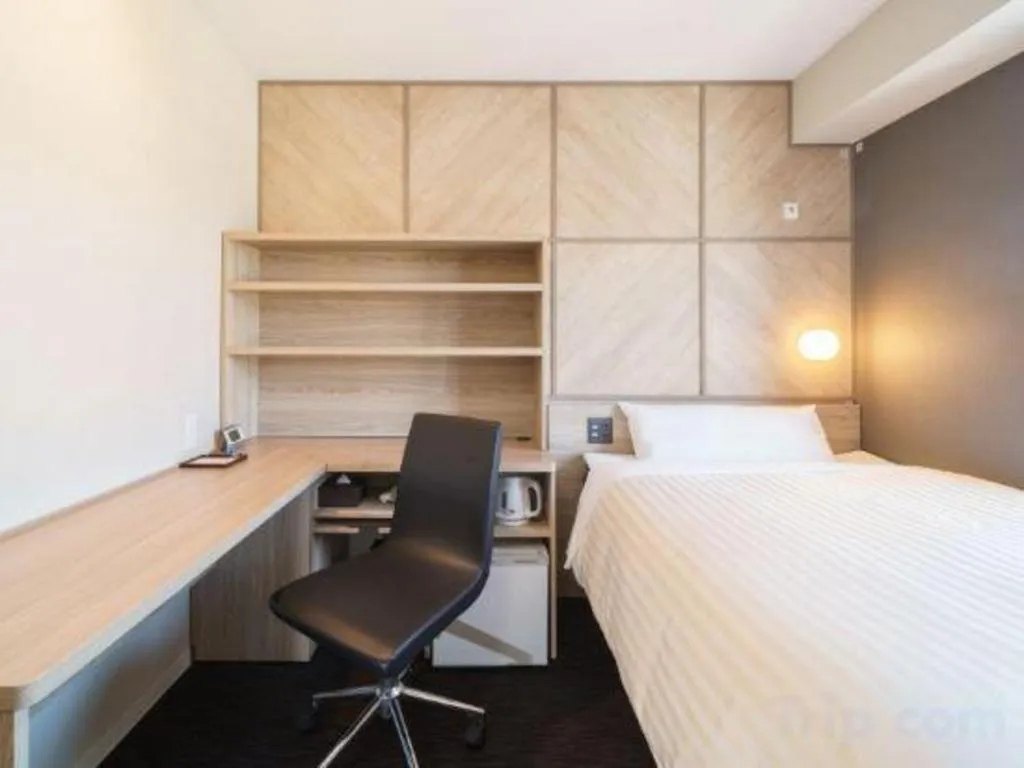 Bed in Super Hotel Satsuma Sendai