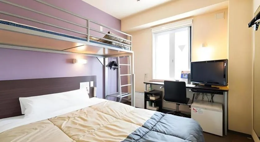 Bed in Super Hotel Satsuma Sendai