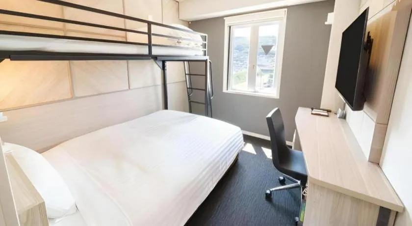 Bed in Super Hotel Satsuma Sendai