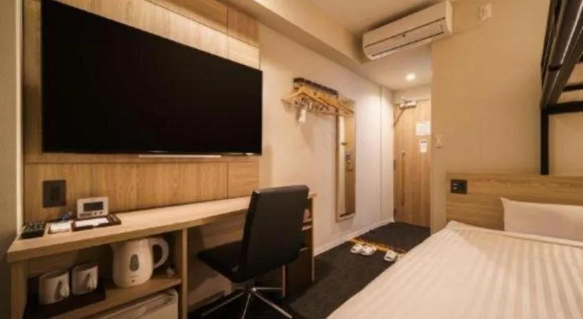 Bed in Super Hotel Satsuma Sendai