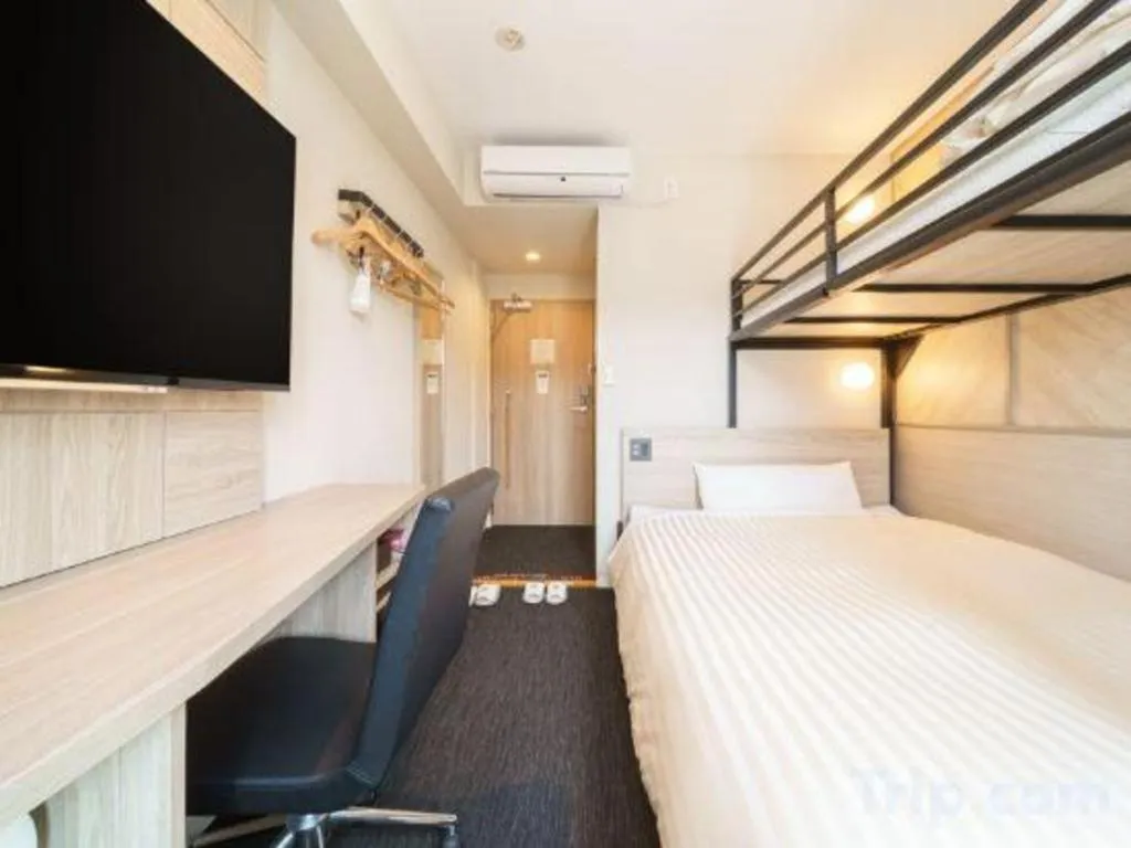 Bed in Super Hotel Satsuma Sendai