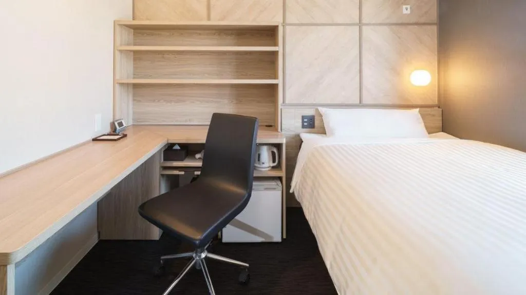 Bed in Super Hotel Satsuma Sendai