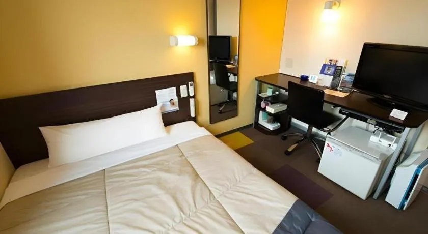 Bed in Super Hotel Satsuma Sendai