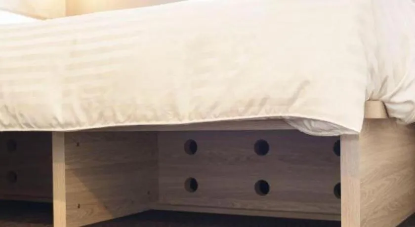 Bed in Super Hotel Satsuma Sendai