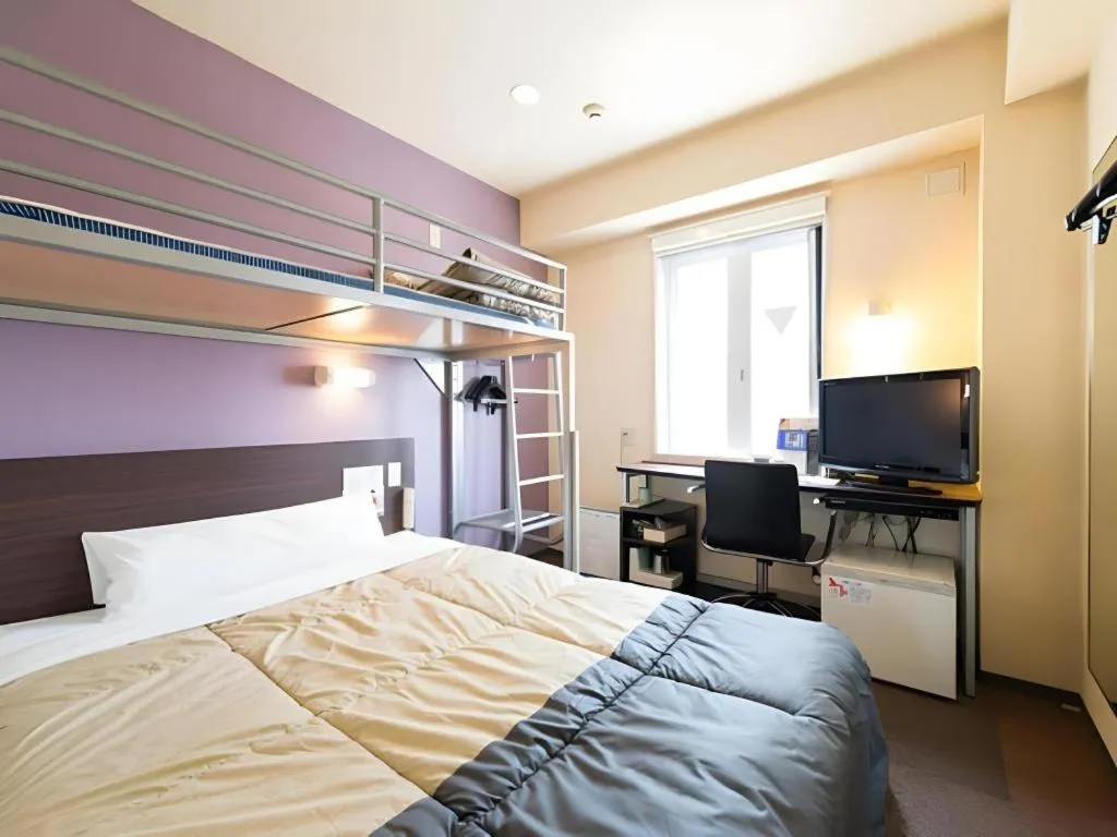 Bed in Super Hotel Satsuma Sendai