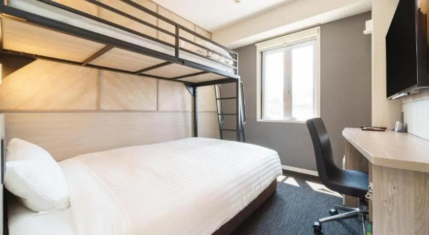 Bed in Super Hotel Satsuma Sendai