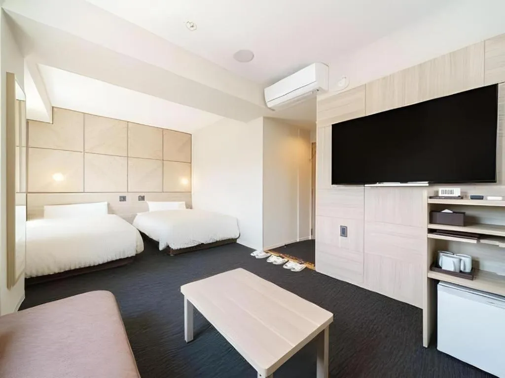 Bed in Super Hotel Satsuma Sendai