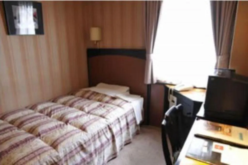 Bed in Hotel Half Time