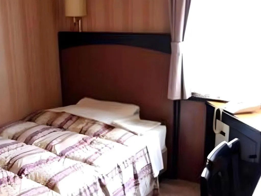 Bed in Hotel Half Time