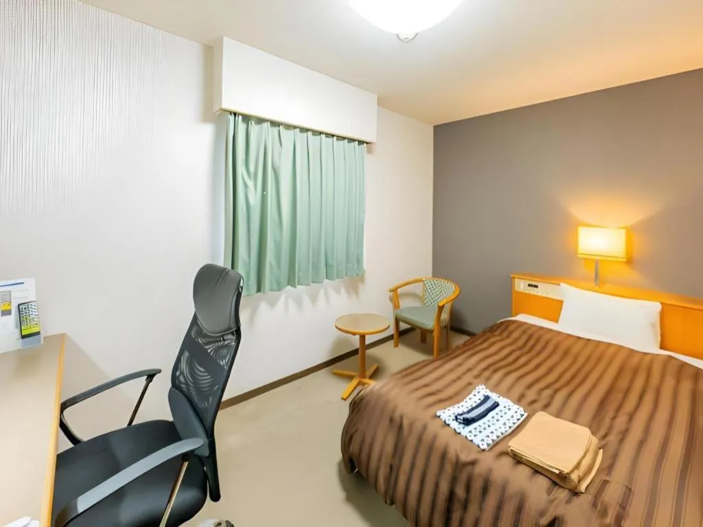 Bed in Mimatsu Hotel